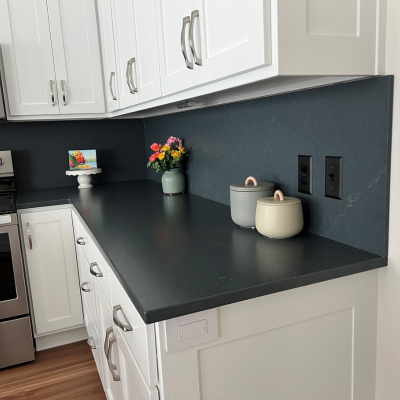 Dark backsplash tile in a kitchen